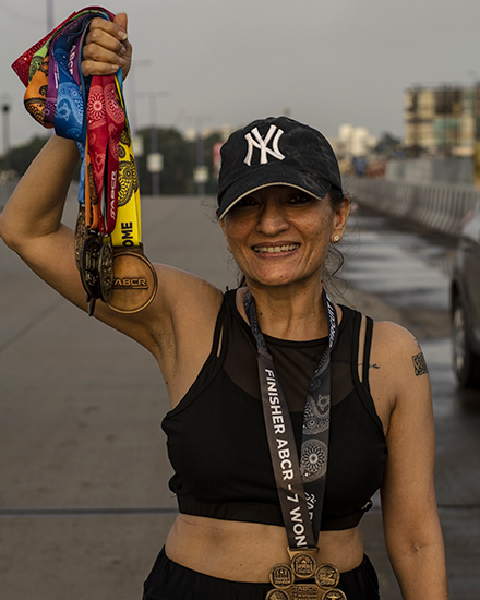 Coach Dina Patel, founder of RunWithDina and Monsoon Miles