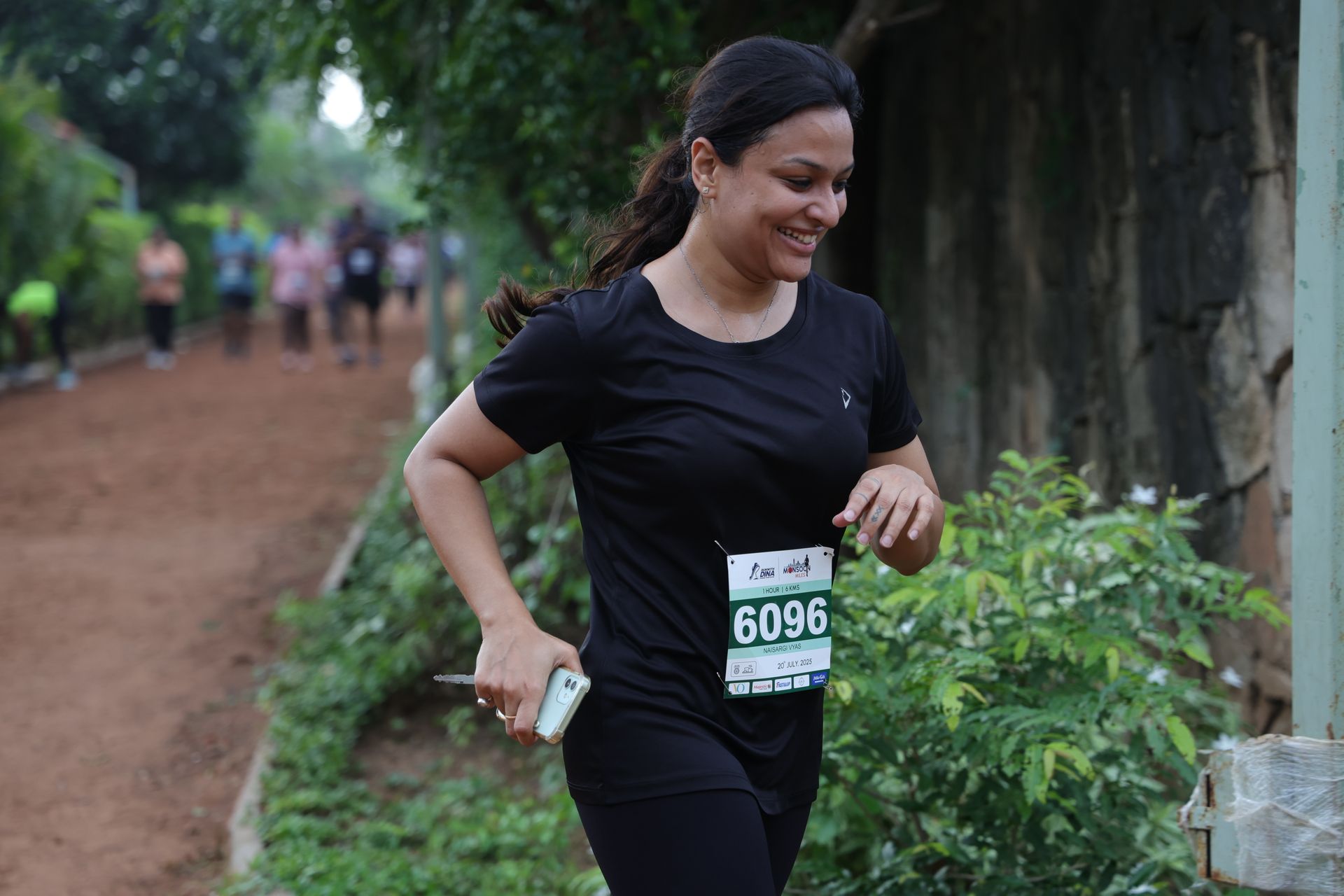 Smiling runner on trail